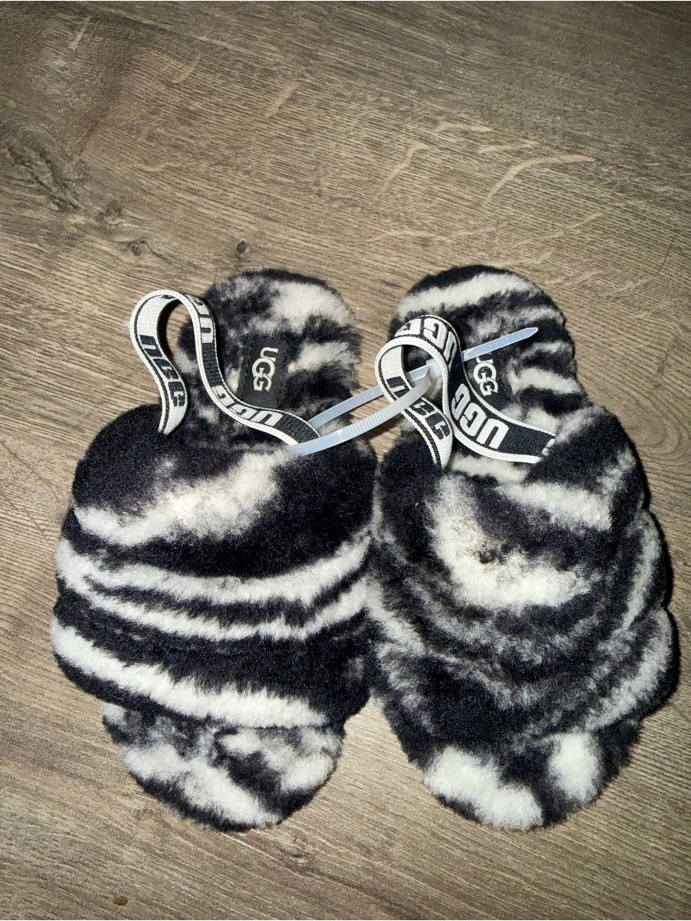 UGG Black & White Faux Fur Zebra Slides with Branded Strap